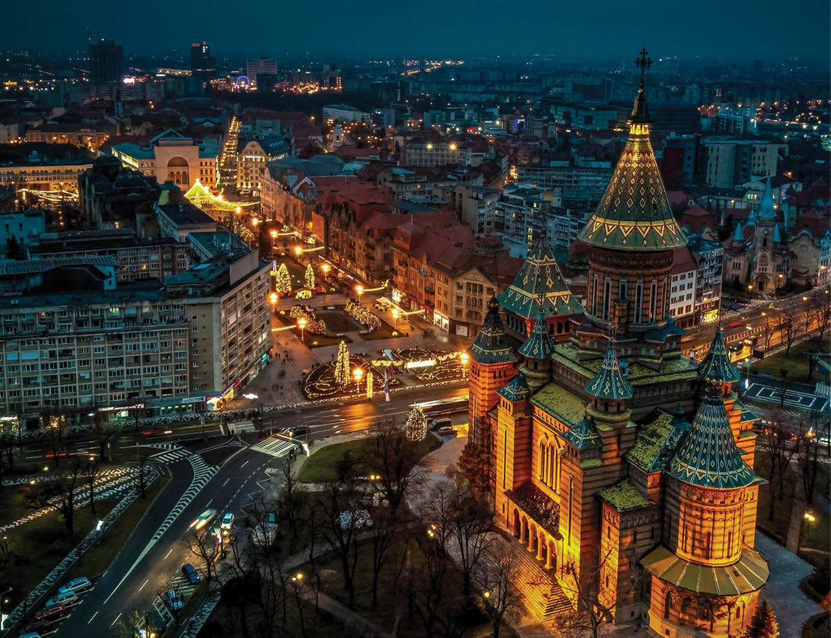 Aerial view of the city center of Timisoara with holiday lights and the Orthodox Metropolitan Cathedral. Photo taken on 26th of December 2021, in Timisoara, Timis County, Romania.